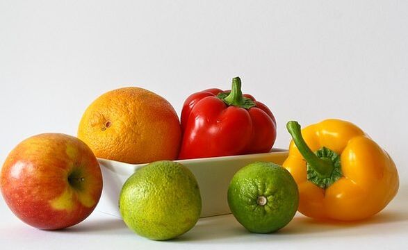 Apple, orange, peppers and limes